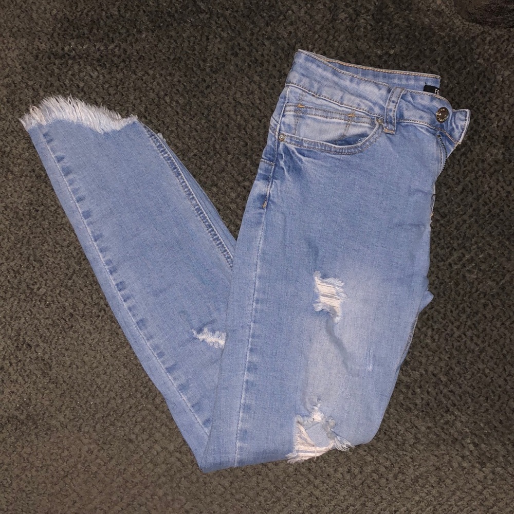 Distressed skinny jeans